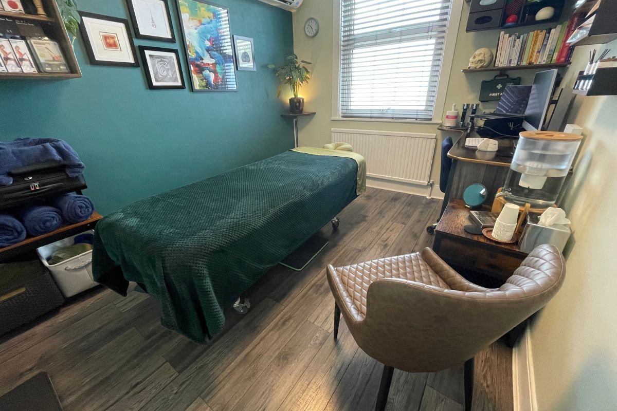 The professional and calming interior of Steven Murdoch’s TMJ massage clinic in London, featuring a treatment table and a holistic therapy environment.